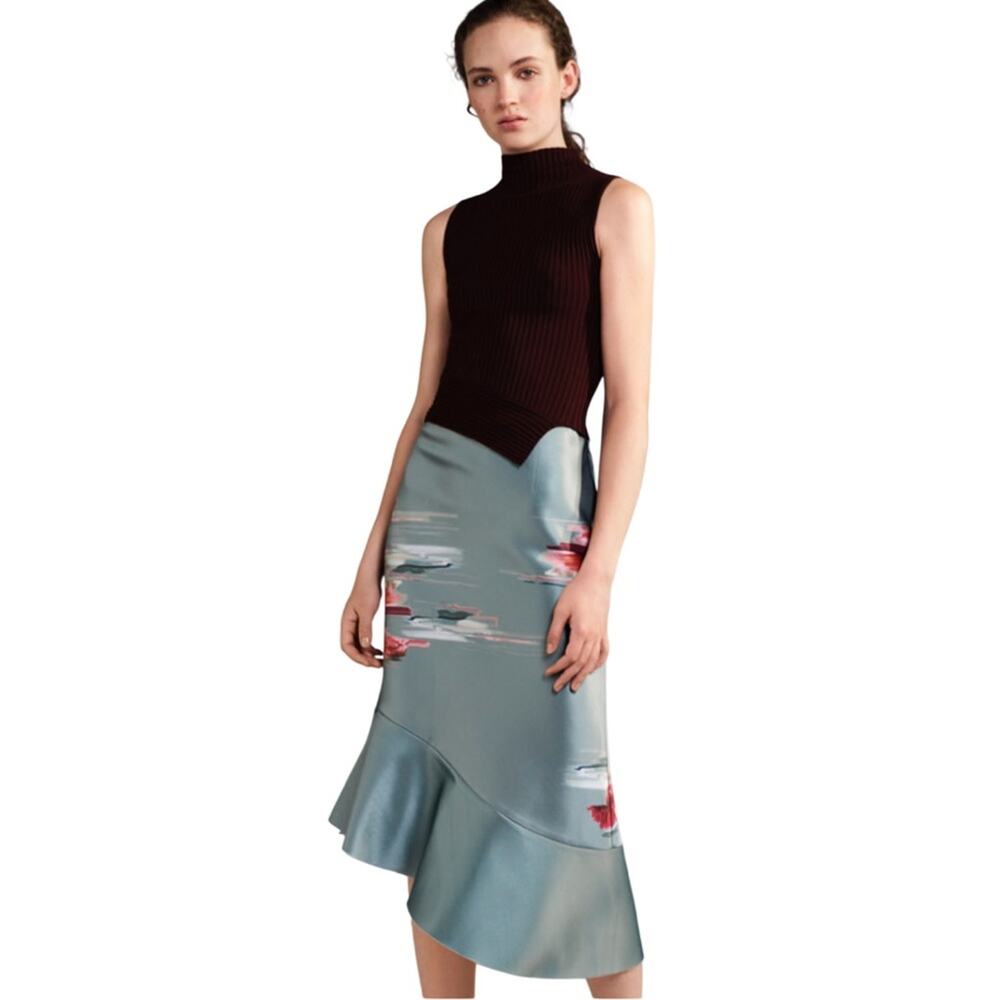 H&M Conscious Exclusive light green asymmetrical skirt Size 4